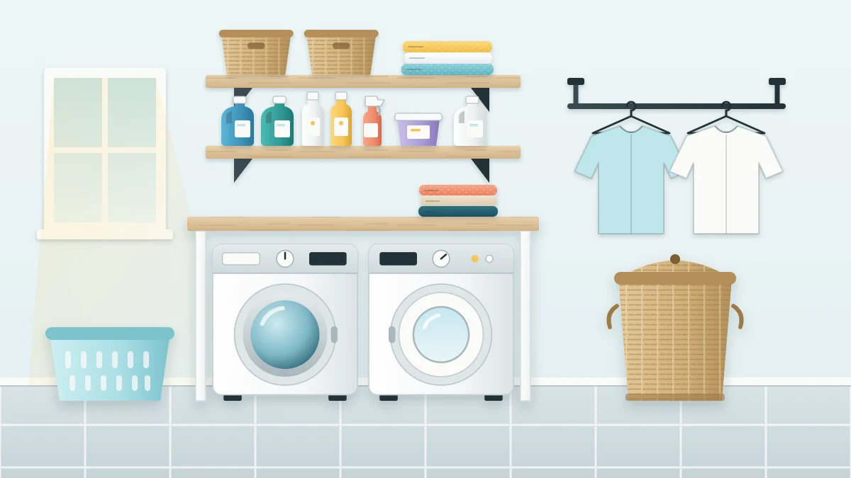 Tidy laundry room with a front-loading washer and dryer under a wooden counter, two wall shelves with baskets and bottles, a hanging rail and a tall hamper