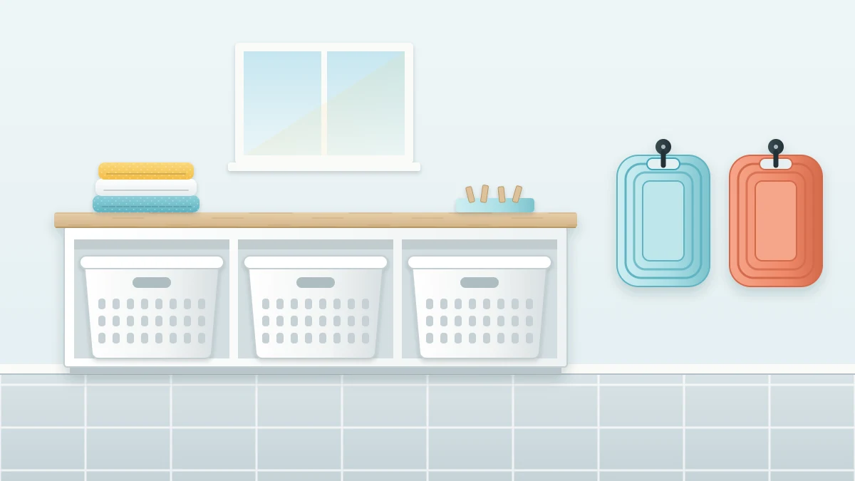 A wooden counter with three open cubbies each holding a white ventilated laundry basket, beside two collapsible baskets hanging flat on wall hooks