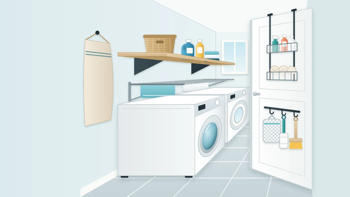 Very narrow laundry room seen from the doorway with a washer and dryer, one shelf, a wall-mounted folding drying rack, an over-door rack and a clear floor