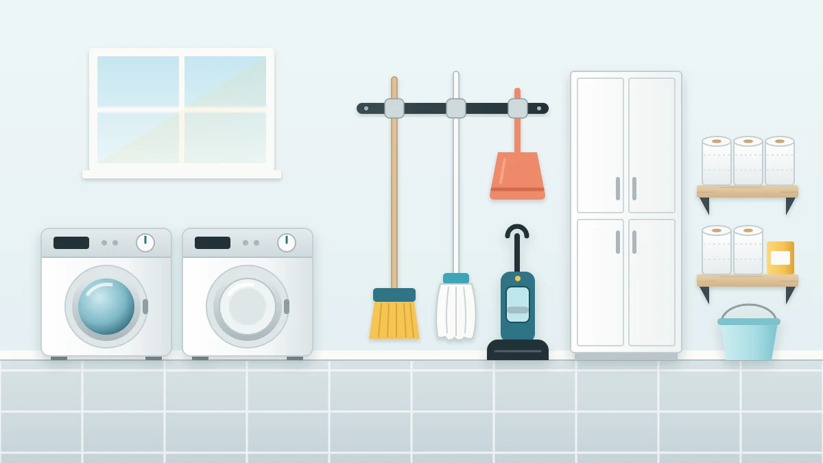 A utility room with a washer and dryer on the left and a cleaning-tools wall on the right with a clip rail, vacuum, tall cabinet and shelf of paper towels